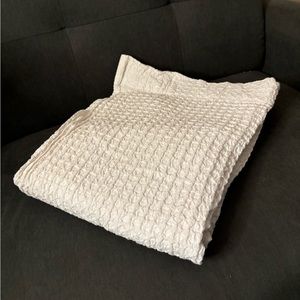 Textured white shower curtain